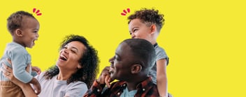 A man and women carry two young children