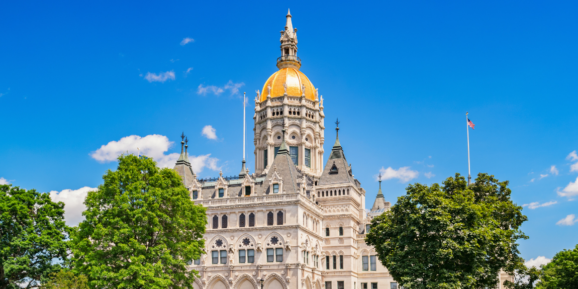 The CT capitol building is pictured on a sunny, clear day