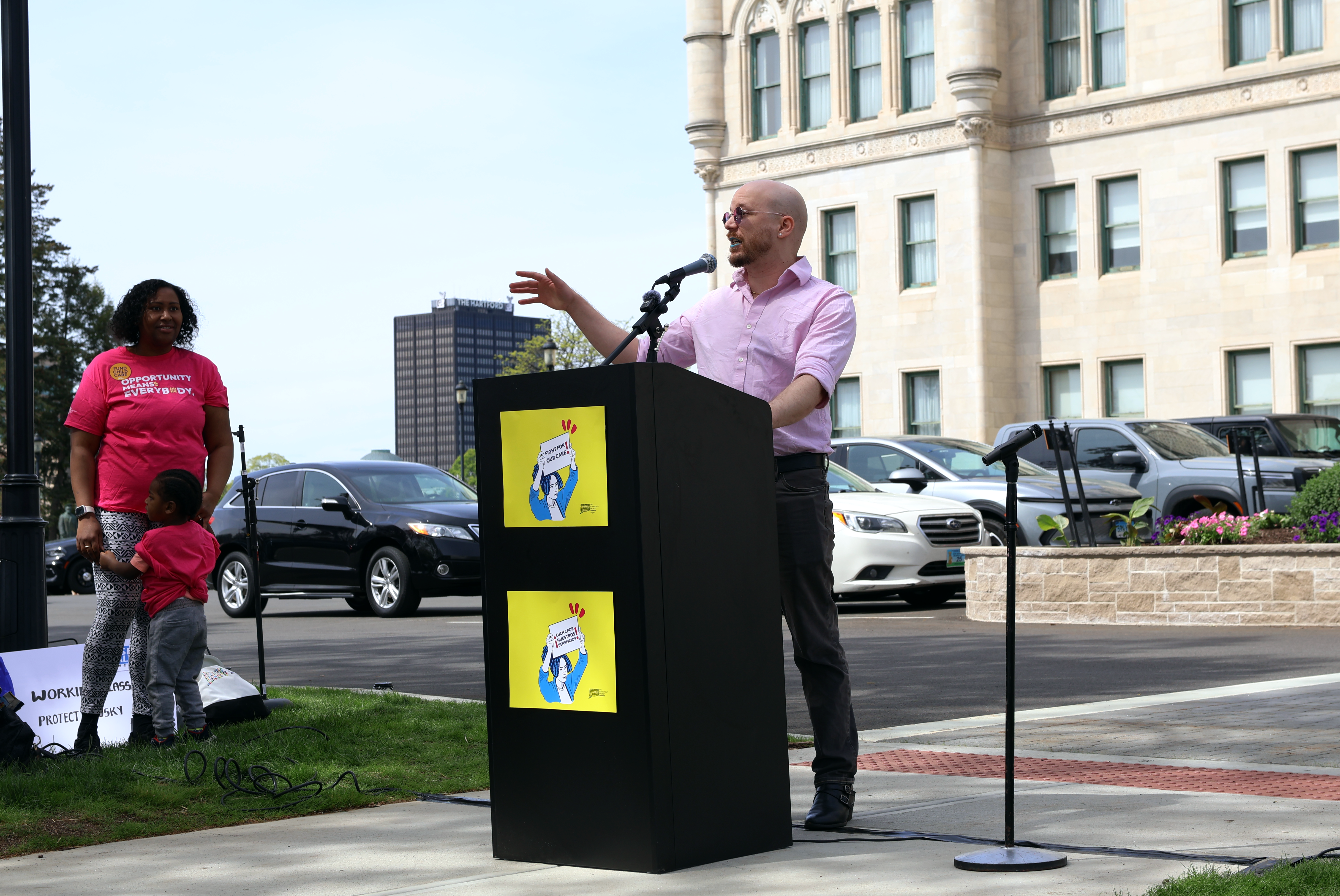 Phoenix Lightbringer stands at a podium